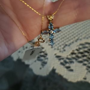 Sky blue topaz & diamond cross necklace